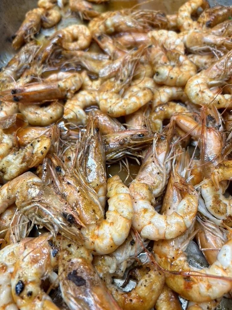 A pan of garlic and chilli prawns
